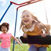 Girls Playing With Swing