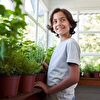 Teenager Boy With Plants